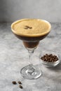 Espresso Martini cocktail drink. Alcohol cocktail with foam and coffee beans. Party drinks Royalty Free Stock Photo