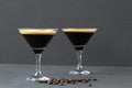 Espresso Martini cocktail garnished with coffee beans on dark table. Royalty Free Stock Photo