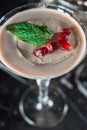 Espresso Martini cocktail, grains of pomegranate on top Royalty Free Stock Photo