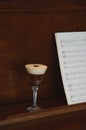 Espresso Martini cocktail on the piano