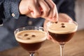 Espresso martini vodka short drink as a coffee cocktail inclduing coffee liqueur and vanilla syrup Royalty Free Stock Photo