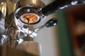 Espresso pouring from bottomless portafilter Royalty Free Stock Photo