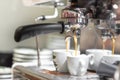 Espresso pouring from espresso coffee machine. Hot beverages. Two espresso pouring from espresso coffee machine. Hot Royalty Free Stock Photo