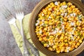 Esquites salad is a grilled Mexican corn with a creamy sauce, seasoned with chile and lime juice and topped with Cotija cheese