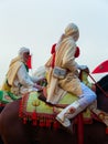 Equestrians participating in a traditional event Tbourida dressed in a traditional Moroccan outfit and accessories of the knights Royalty Free Stock Photo