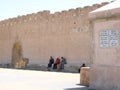 Group of people next to a wall in Essaouira, Morocco