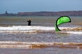 ESSAOUIRA, MOROCCO - JUNE 10, 2017: Kiteboarding activities on the Atlantic ocean waves in the Essaouira