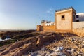 ESSAOUIRA, MOROCCO - JUNE 08, 2017: View of the historical walls of the Essaouira fortress and volcanic shore of the Atlantic