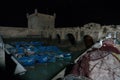 Essaouira port in Morocco. Blue fishing boats of Essaouira at night