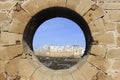 Essaouira Ramparts view through a fortress window in Morocco. Essaouira is a city in the western Moroccan region on the Royalty Free Stock Photo