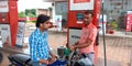 essar petrol pump attender filling petrol tank in India oct 2019