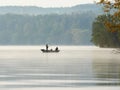 Essen, Germany, May 1, 2022 - Anglers fishing in boats on Lake Baldeneysee in the morning