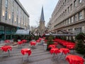 Essen, Germany: November 28, 2021 - An empty, closed Christmas Market with the Essener Dom Cathedral in the background