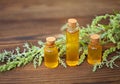 Essence of lavender flowers on table in beautiful glass bottle Royalty Free Stock Photo