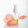 Essencial rosewater in a pump flacon Royalty Free Stock Photo