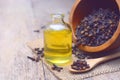 Essential aroma clove oil in a glass bottle. Royalty Free Stock Photo