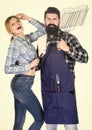 Essential barbecue dishes. Family getting ready for barbecue. Bearded hipster and girl hold cooking grilling utensils