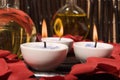 Essential body massage oils with candles