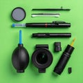 Essential Camera Cleaning Tools on Green Background Royalty Free Stock Photo