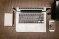 Essential gadgets phone, laptop and note pad for mobile office Royalty Free Stock Photo