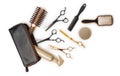 Essential hair dresser tools with leather bag on white background Royalty Free Stock Photo