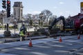 essential local construction workers are busy fixing roads