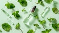 Essential oil. Botanical extract in a transparent dropper bottle with green leaves around. Concept of herbal essence Royalty Free Stock Photo