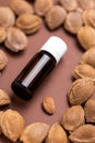 Essential oil bottle of apricot kernels in apricot kernels