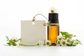 Essential oil, empty tags and chamomile