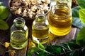 Essential oil in glass bottle with dried chamomile flowers. essential oils and medical flowers herbs Royalty Free Stock Photo