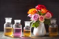 Essential oil and rose flowers aromatherapy spa perfumery Royalty Free Stock Photo