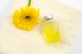 Essential oil on the yellow towel Royalty Free Stock Photo