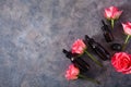 Essential oils in bottles rose flowers. alternative medicine aromatherapy