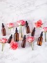 Essential oils in bottles rose flowers. alternative medicine aromatherapy