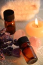 Essential oils with candle Royalty Free Stock Photo