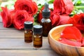 Essential oils with red roses Royalty Free Stock Photo