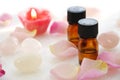 Essential oils with rose candle Royalty Free Stock Photo