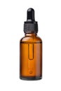 Essential serum oil in amber dropper bottle Royalty Free Stock Photo