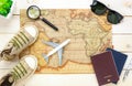 Essential travel summer items.The notebook tree map pas