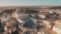 Establishing aerial shot of Vatican City. Crowded St. Peter`s Square