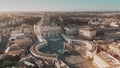 Establishing aerial shot of Vatican City. Crowded St. Peter`s Square