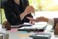 Estate agent giving house keys to man and sign agreement with ho Royalty Free Stock Photo