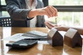 estate agent giving house keys to man and sign agreement in office Royalty Free Stock Photo