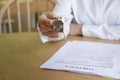 Estate agent handing over house keys Royalty Free Stock Photo