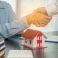 Estate agent shaking hands with client after contract signature and done business deal for transfer right of property. Man broker Royalty Free Stock Photo
