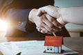 Estate agent shaking hands with his customer after contract sign Royalty Free Stock Photo