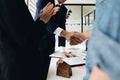 Estate agent shaking hands with his customer after contract sign Royalty Free Stock Photo