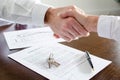 Estate agent shaking hands with his customer Royalty Free Stock Photo