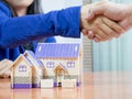 Estate agents join hands with buyers Royalty Free Stock Photo