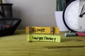 Estate and Lawyer/Notary. Handwriting on sticky notes in clothes pegs on wooden office desk